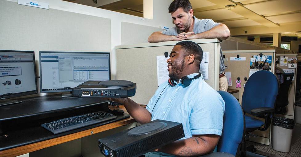 Cam at his desk with the Focal and JBL compact powered subs