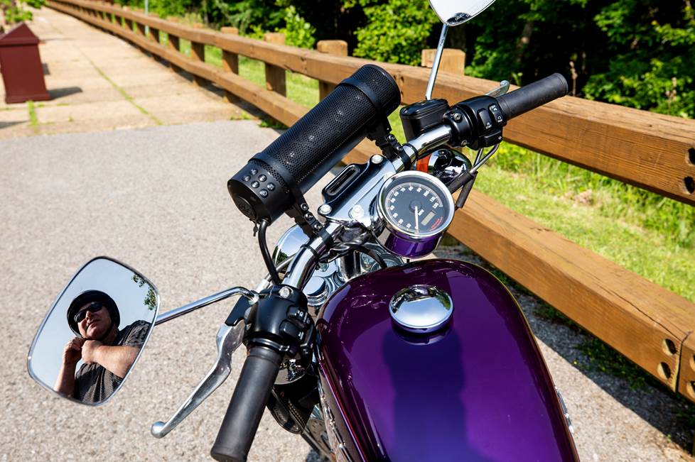 Levi's MTX bluetooth speaker installed on his Harley=Davidson.