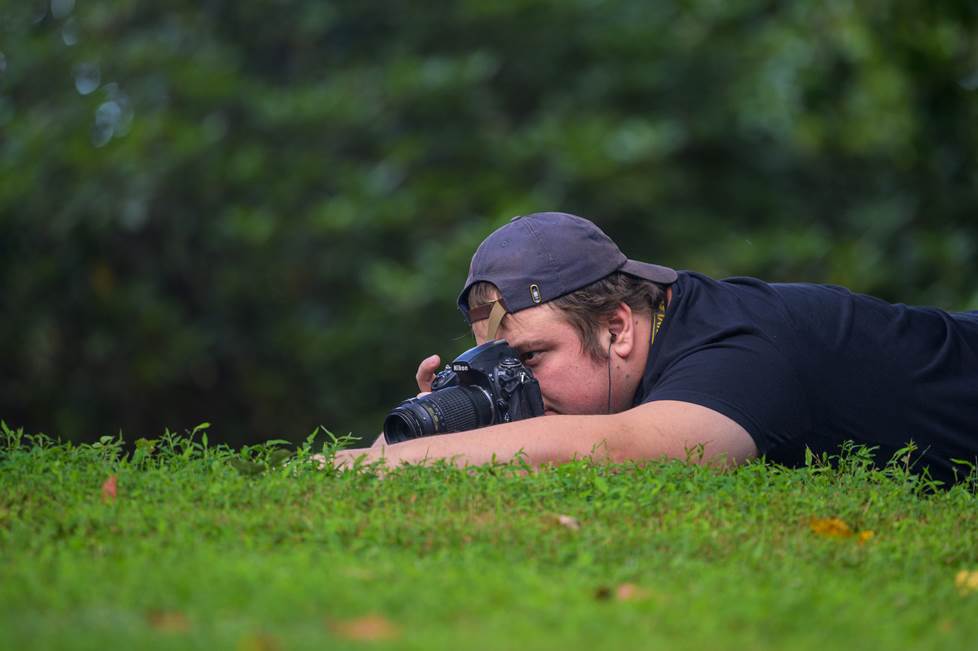 Trainees testing cameras out in the field