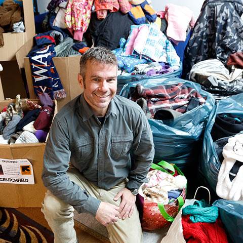 We're all about employee-driven initiatives at Crutchfield, like Tommy's annual coat drive for local families in need.