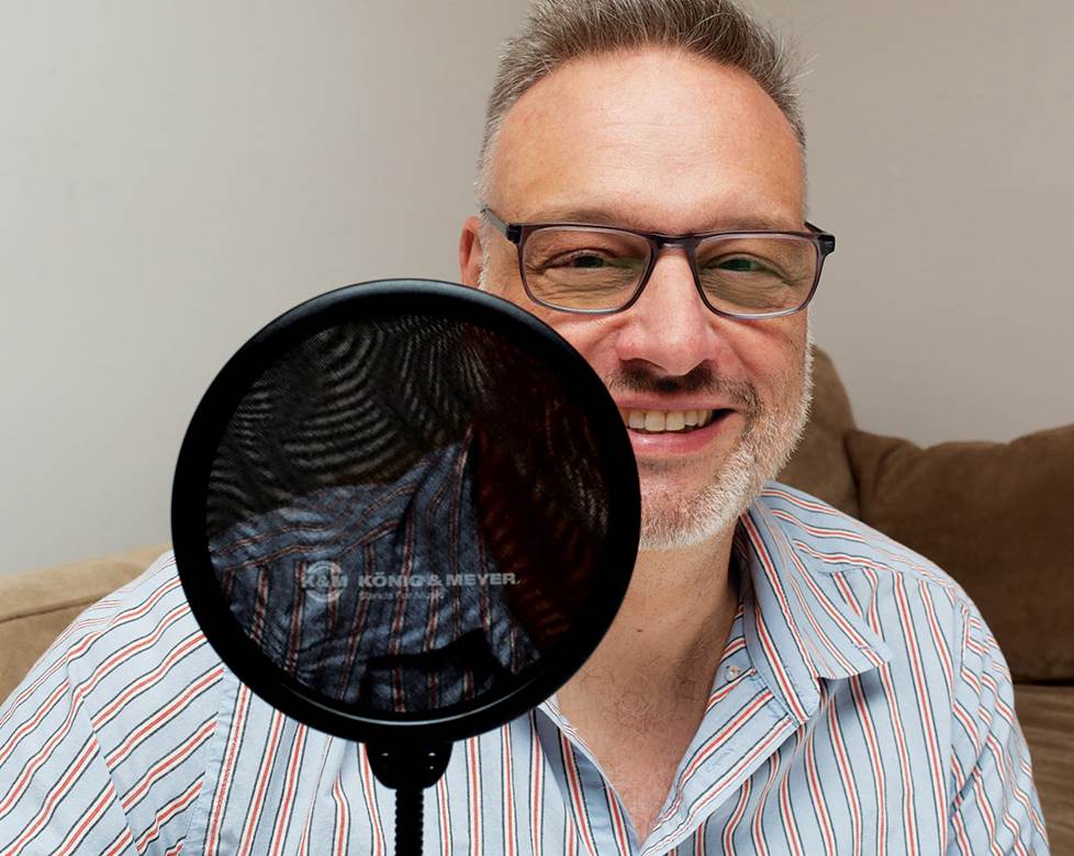 Man with mic pop filter