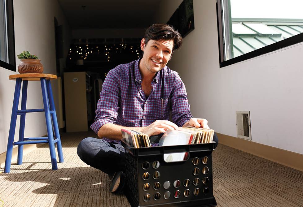 Man digging in a record crate