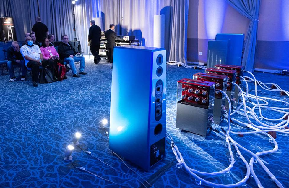 Oppulent high-end audio demo room with blue lighting