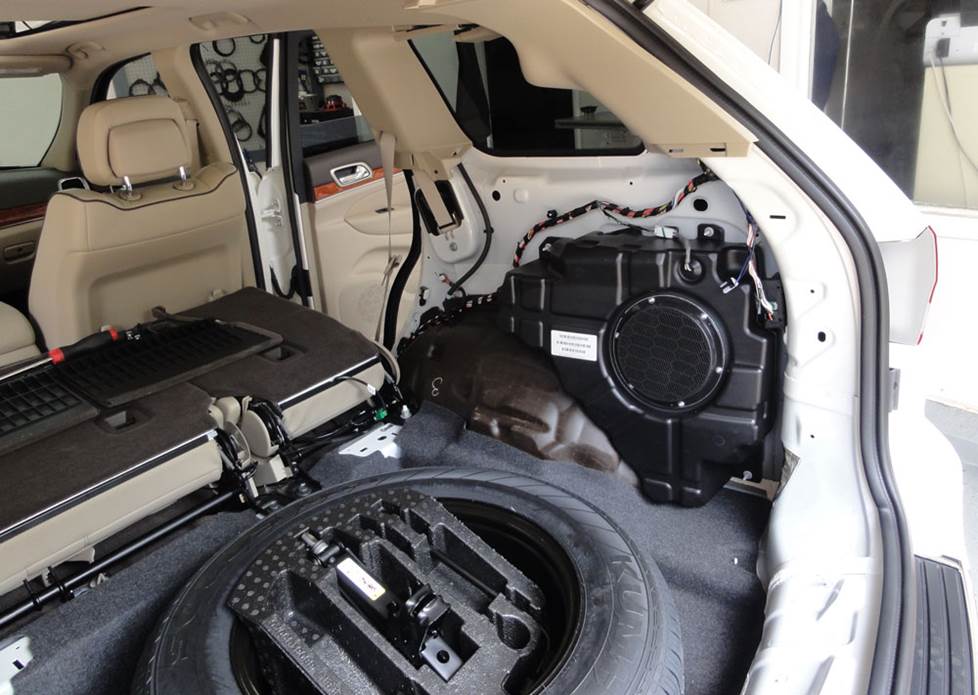 jeep grand cherokee rear subwoofer removal