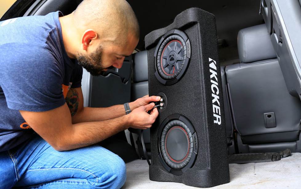 Carlos hooking up the Kicker subwoofer