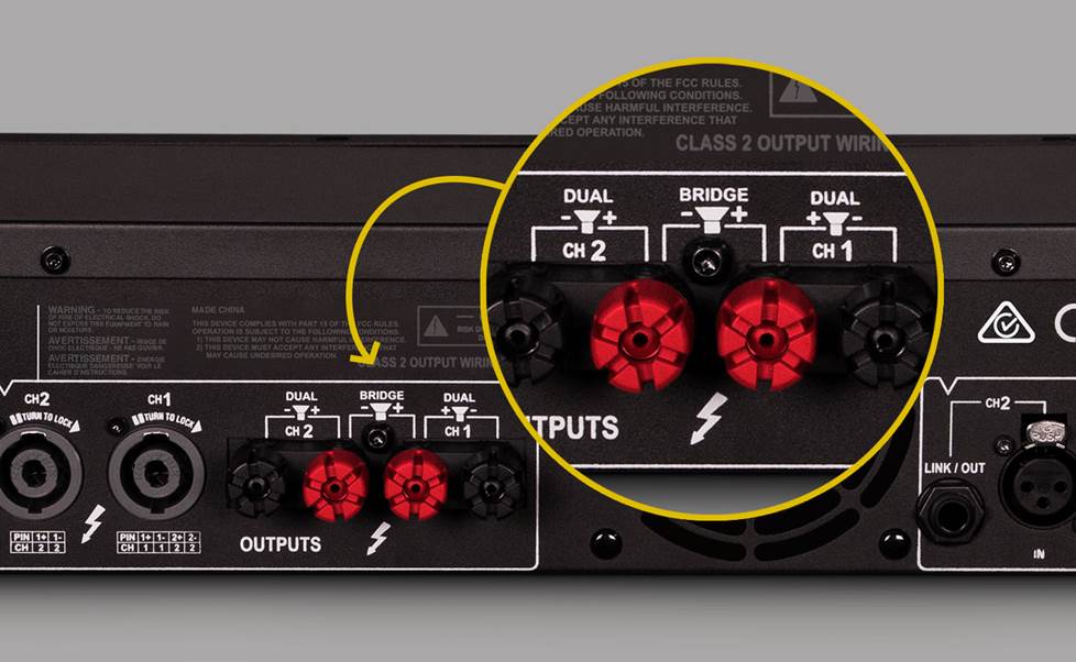 Amplifier bridged mode hookup detail on back of amp