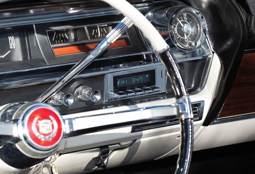Close-up on dash of 1963 Cadillac with Retrosound radio