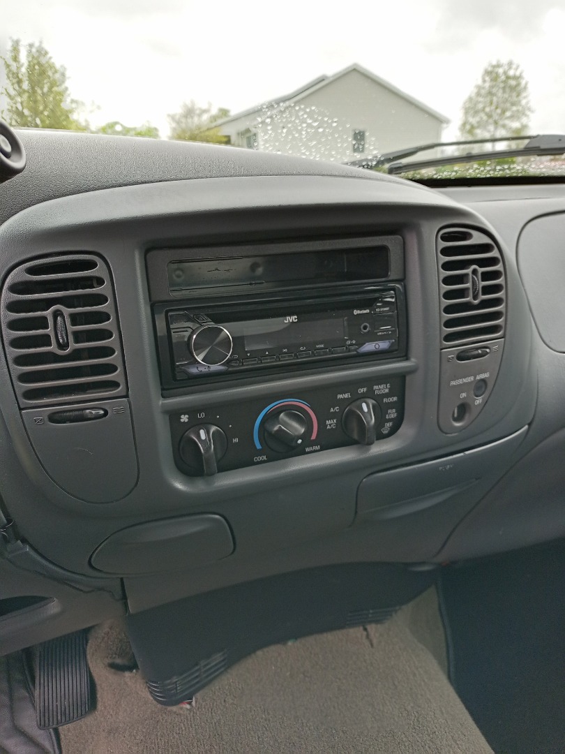 American International FMK-550 Dash Kit (Black) Fits select 1995-2011 Ford,  Lincoln, Mazda, and Mercury vehicles — single-DIN radios at Crutchfield