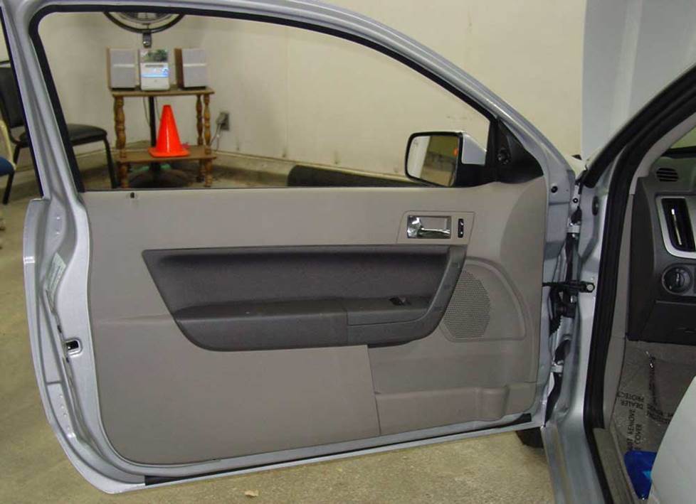 ford focus coupe door speakers