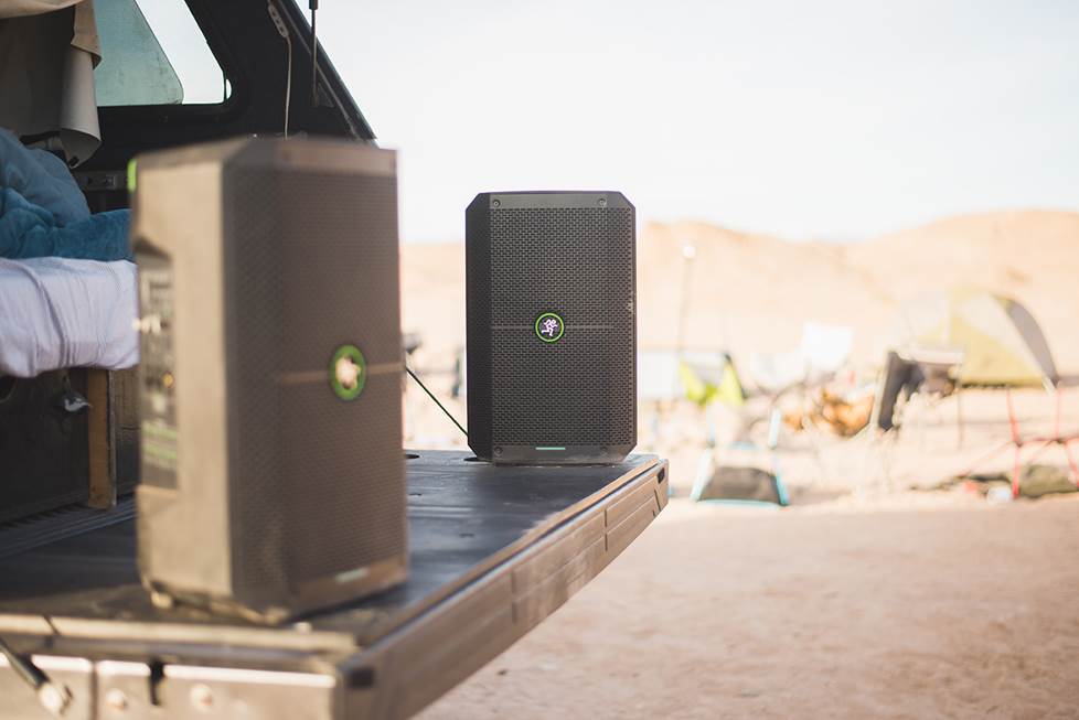 powered pa speaker on a truck tailgate at the beach