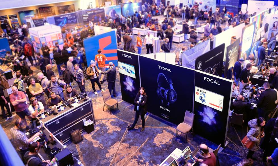 Overhead view of the Focal booth surrounded by a crowd of people.