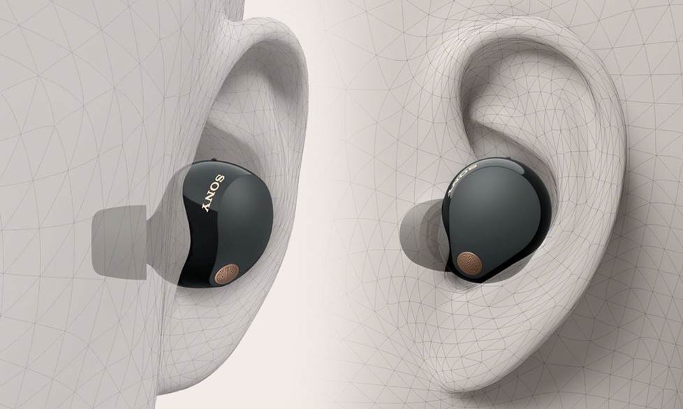 A model ear shown from the front and the side, showing different angles of the earbud's fit into the ear canal.