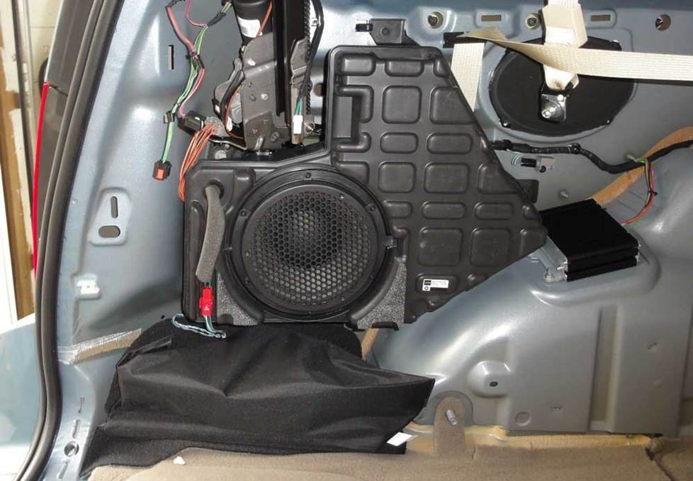 Factory subwoofer (Crutchfield Research Photo)