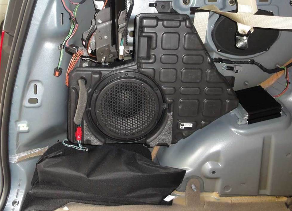 chrysler town and country factory subwoofer