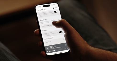 Hand holding phone with app