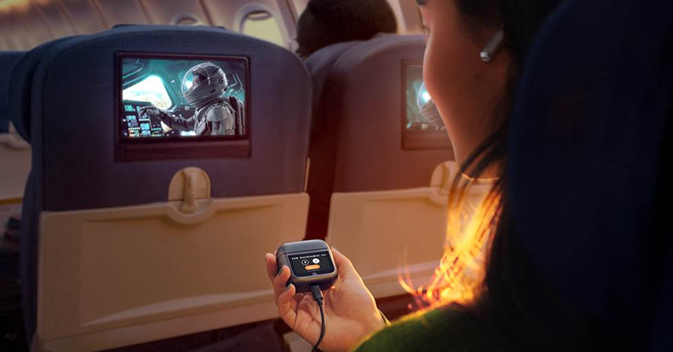 JBL Tour Pro 3 earbuds used on a flight