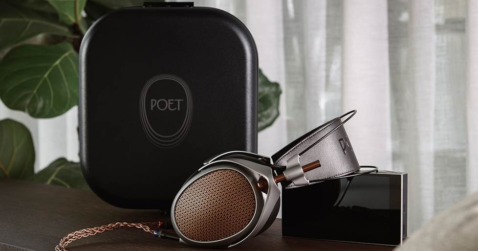 Meze Poet headphones in a listening setup