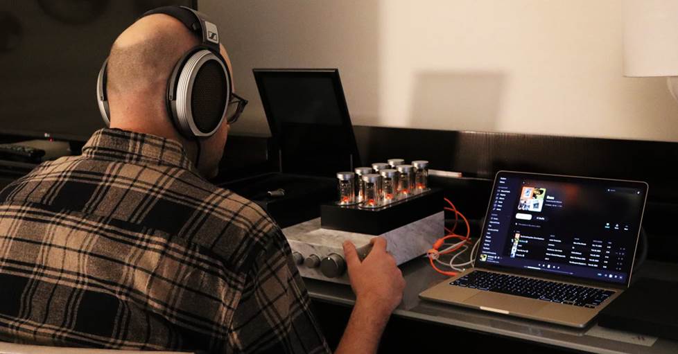 Jeff listening to Sennheiser HE-1