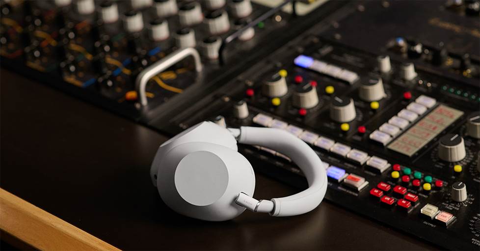Sony XM6 headphones on professional mixing board
