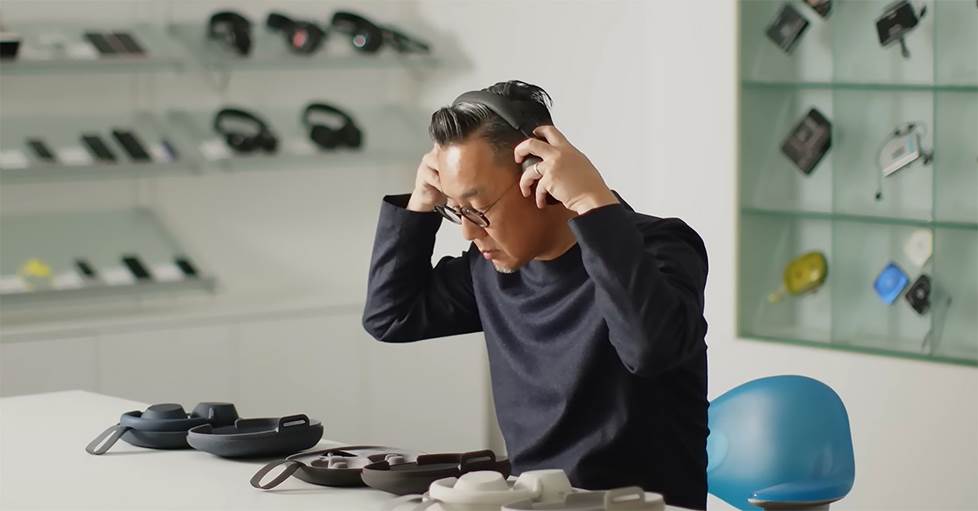 Sumi wearing xm6 headphones