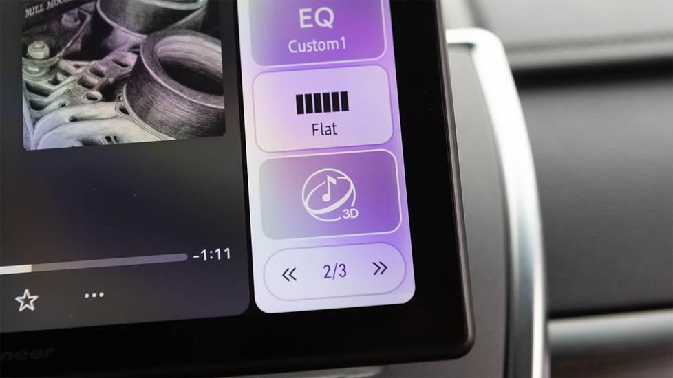 close up of car stereo creen showing spatial audio icon