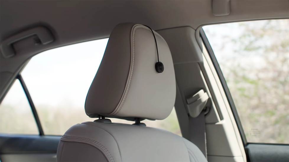 car headrest with small mearsurement microphone attached