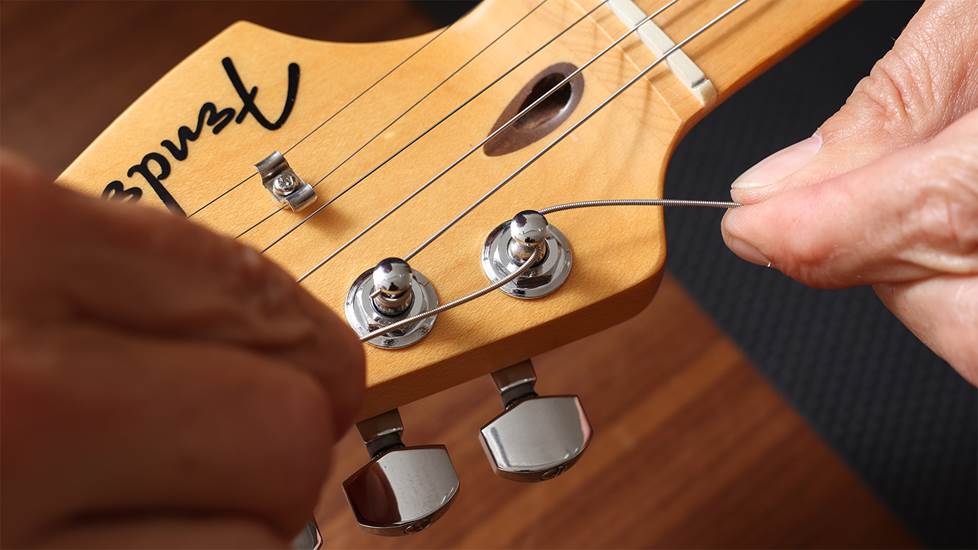 installing a string on a guitar