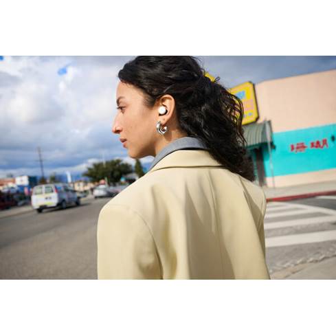 Woman wearing Google Pixel Buds Pro 2