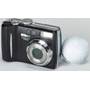 Nikon Coolpix 7900 Size comparison (with golf ball)