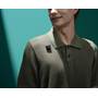DJI Mic Mini Wireless Mic System Transmitter, shown using magnetic mount through clothing