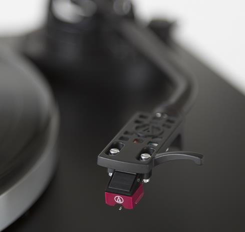 The Audio-Technica AT-LP5 features a classic, reliable J-shaped tonearm.