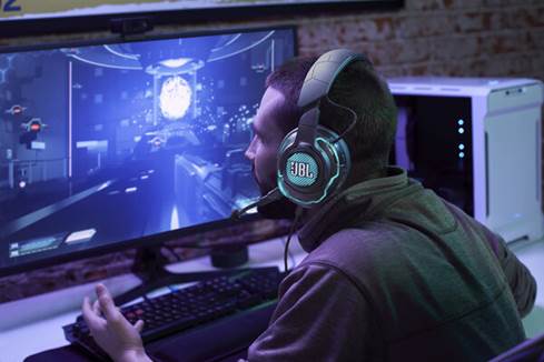 Man wearing JBL Quantum ONE gaming headset