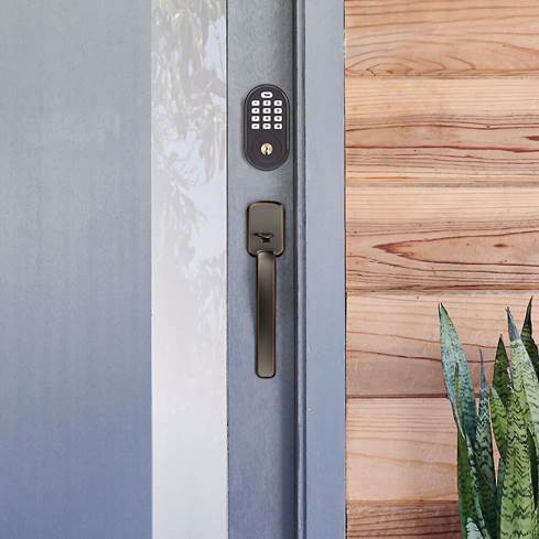 Yale Real Living Assure Lock Keypad Deadbolt on open door