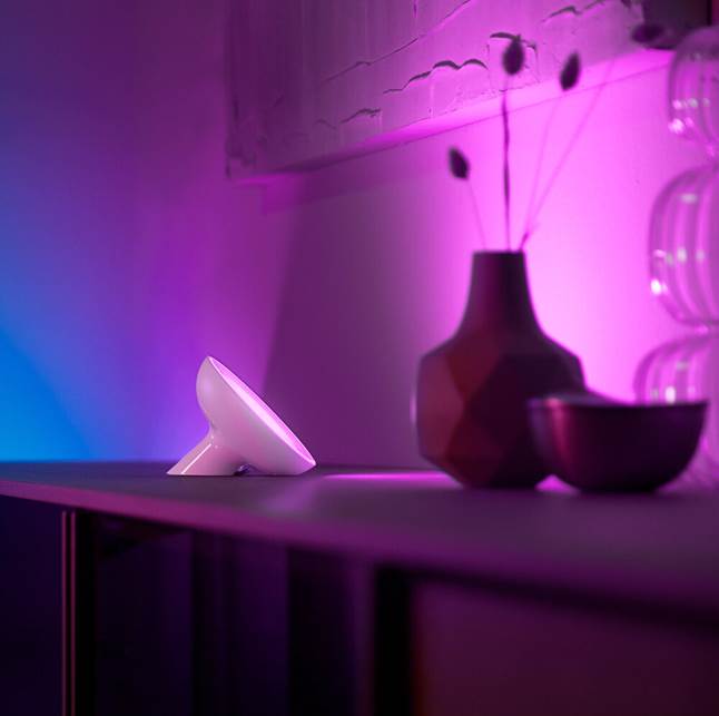 Philips Hue white and color ambiance Bloom lamp paints the wall with color