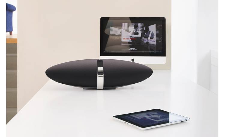 Bowers & Wilkins Zeppelin Air AirPlay illustration: music from iPhone streamed to Zeppelin; video from iPad streamed to Apple TV