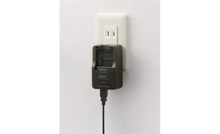 Sony BC-TRX Retractable plug accesses wall socket for charging via cable