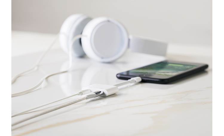 Belkin Audio + Charge Rockstar™ Shown with 3.5mm and Lightning cables, iPhone, and headphones (not included)