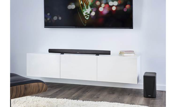 Denon HEOS HomeCinema HS2 Subwoofer connects to sound bar wirelessly
