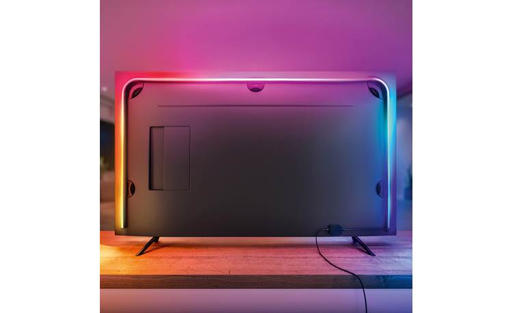 Philips Hue Play Gradient Lightstrip Mounts on the back of your TV with included self-adhesive brackets