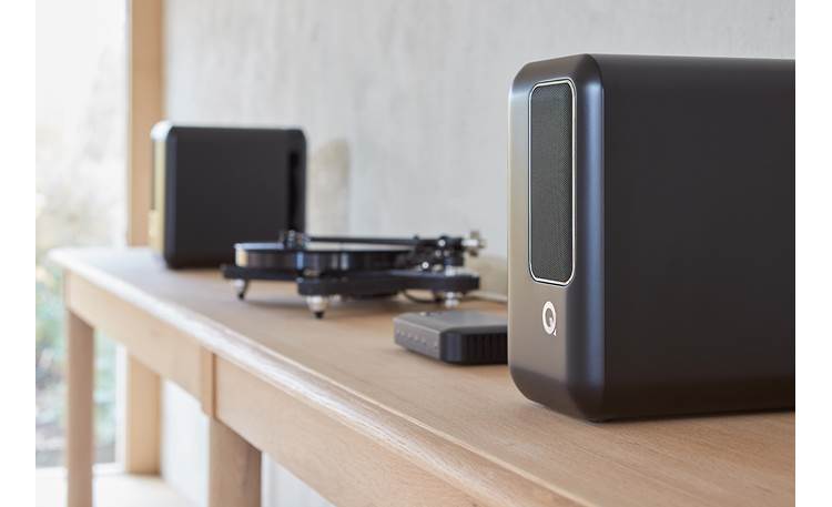 Q Acoustics Q Active 200 System Speakers shown alongside a turntable (not included) connected to their hub