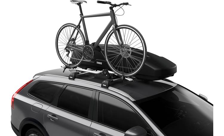 Thule ProRide XT 598004 shown holding bike next to cargo carrier