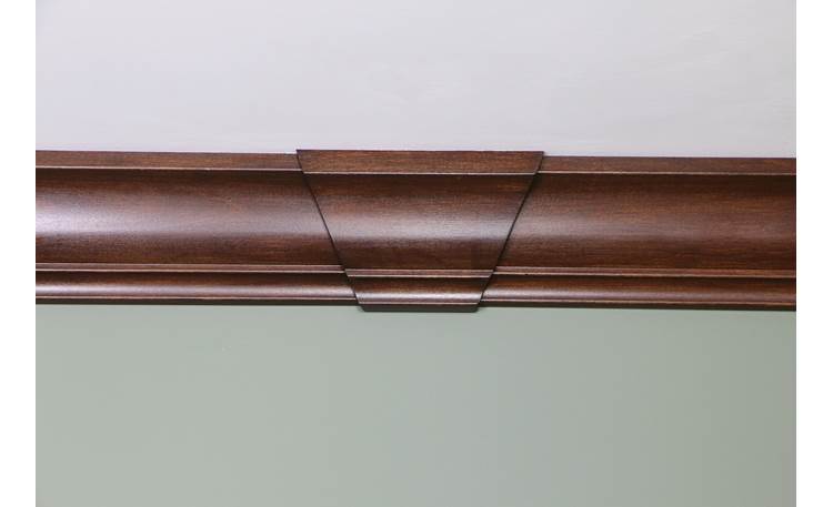 Crownduit® Crown Moulding Keystone Panel shown stained 