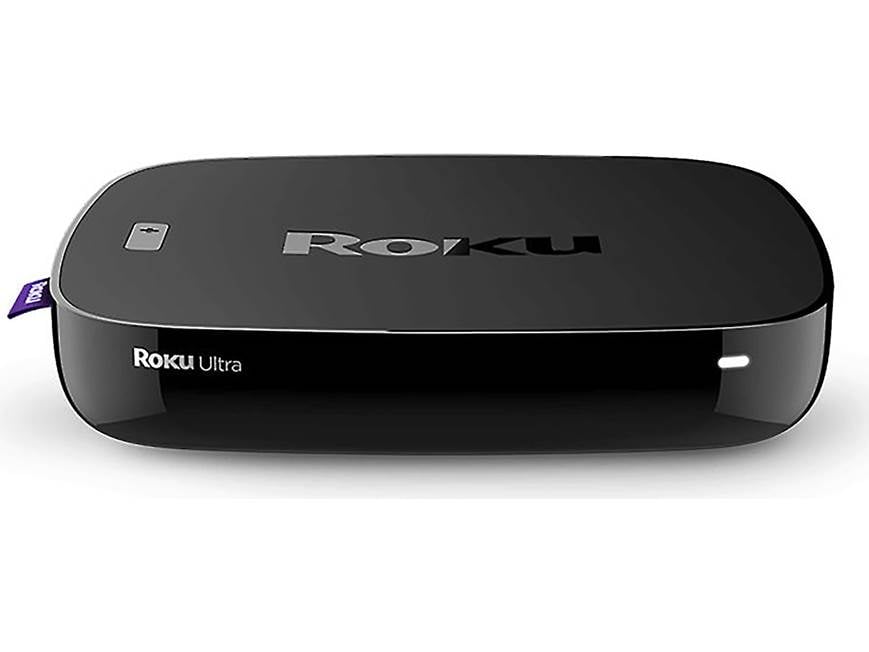 Roku Ultra 4661R Streaming media player with JBL earbuds at