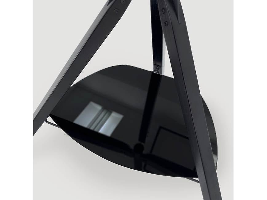 Close-up of tripod leg and circular base shelf