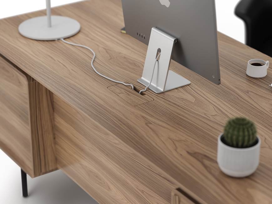 Power and cable management on desk with monitor