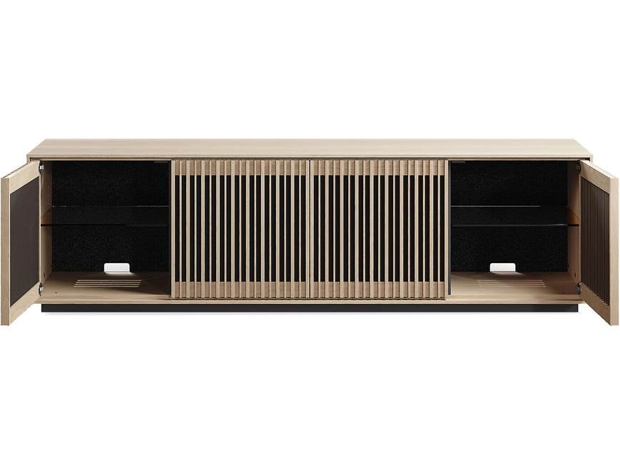 Front of wooden cabinet with slatted doors with ample space