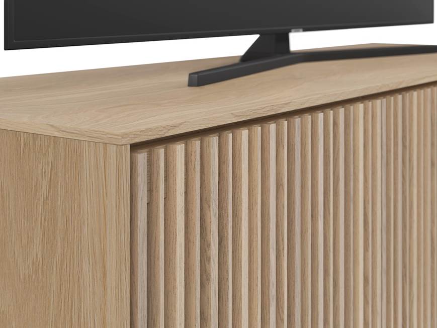 Close-up of wooden slatted front on the media console