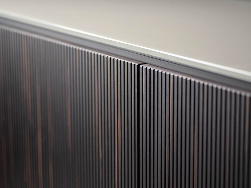 Close-up of vertical ribbed texture on sideboard