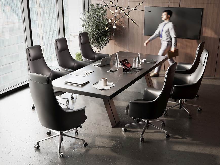 Black executive chairs around conference table in modern office