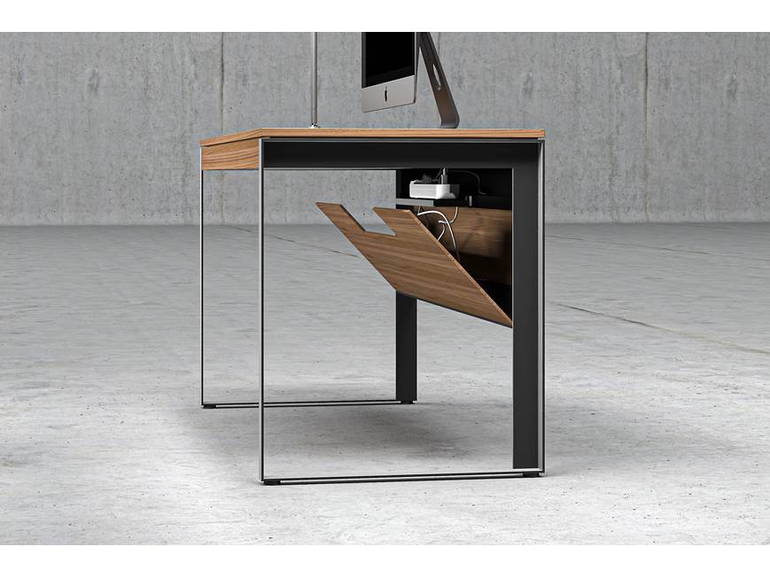 Desk with metal frame in an industrial setting
